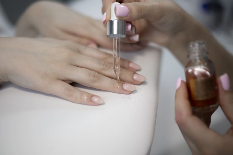 a-manicurist-applying-gel-on-the-client-s-nail-pr-2024-09-12-16-55-03-utc (1) (1)