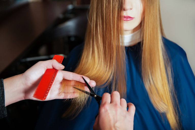 hairdresser-with-scissors-and-comb-2024-12-02-21-08-04-utc (1) (1)