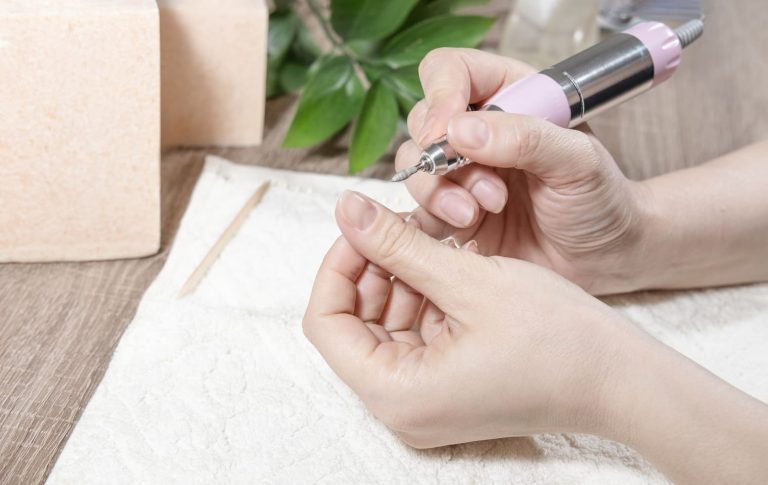 manicurist-woman-processes-nails-and-cuticles-or-2025-01-16-11-44-26-utc (1) (1)